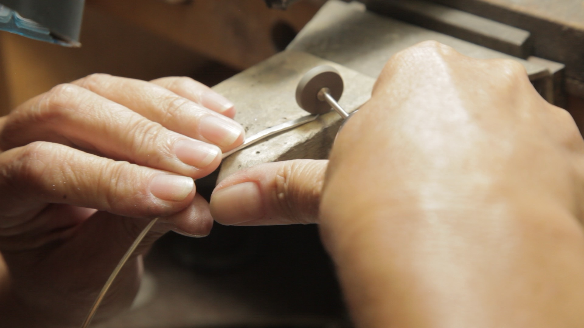 Barbara Shaping a Silver Wire